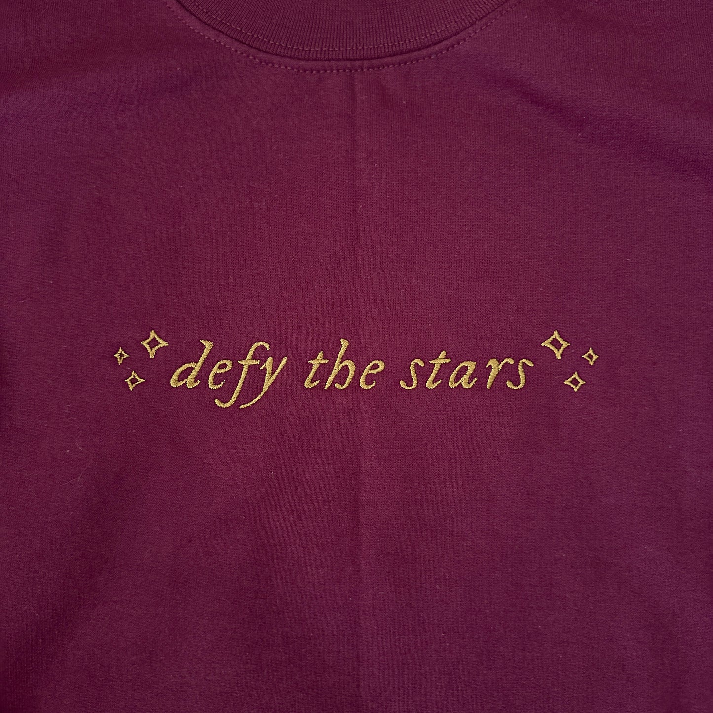 DEFY THE STARS EMBROIDERED CREWNECK