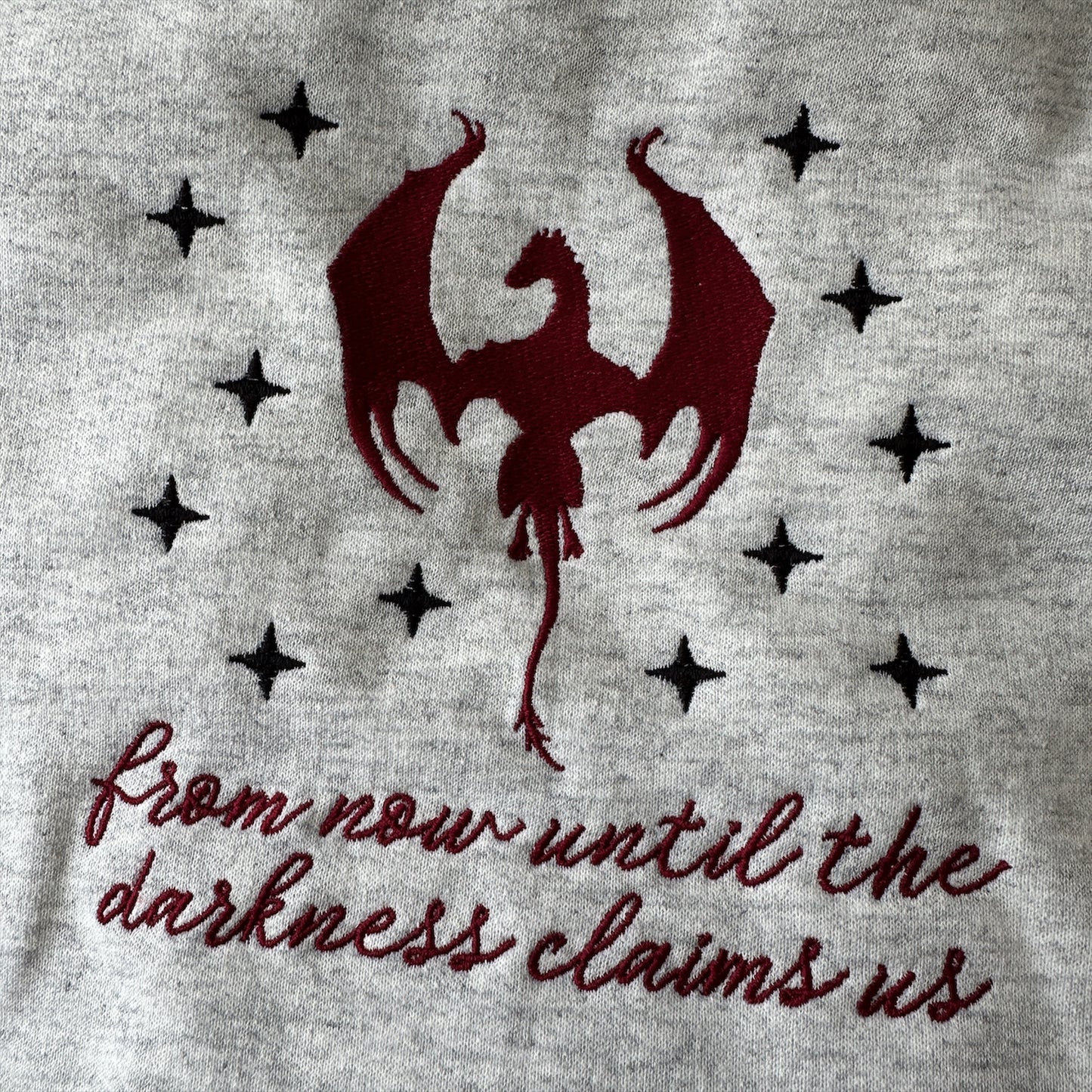 UNTIL THE DARKNESS CLAIMS US EMBROIDERED CREWNECK