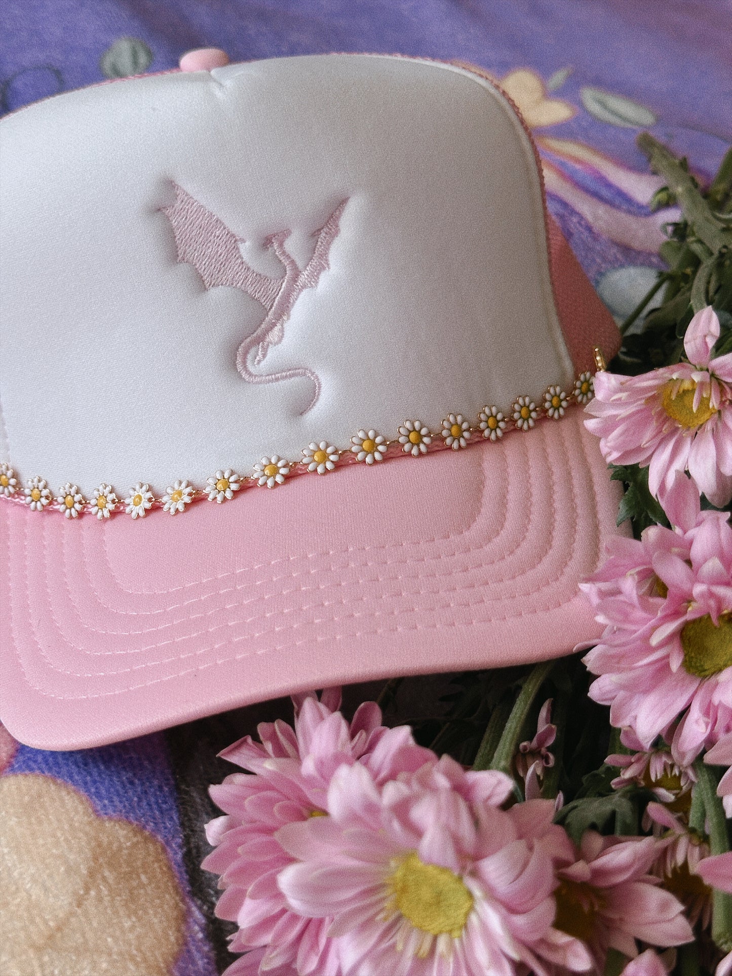 THE FLOWER-LOVING WYVERN TRUCKER HAT