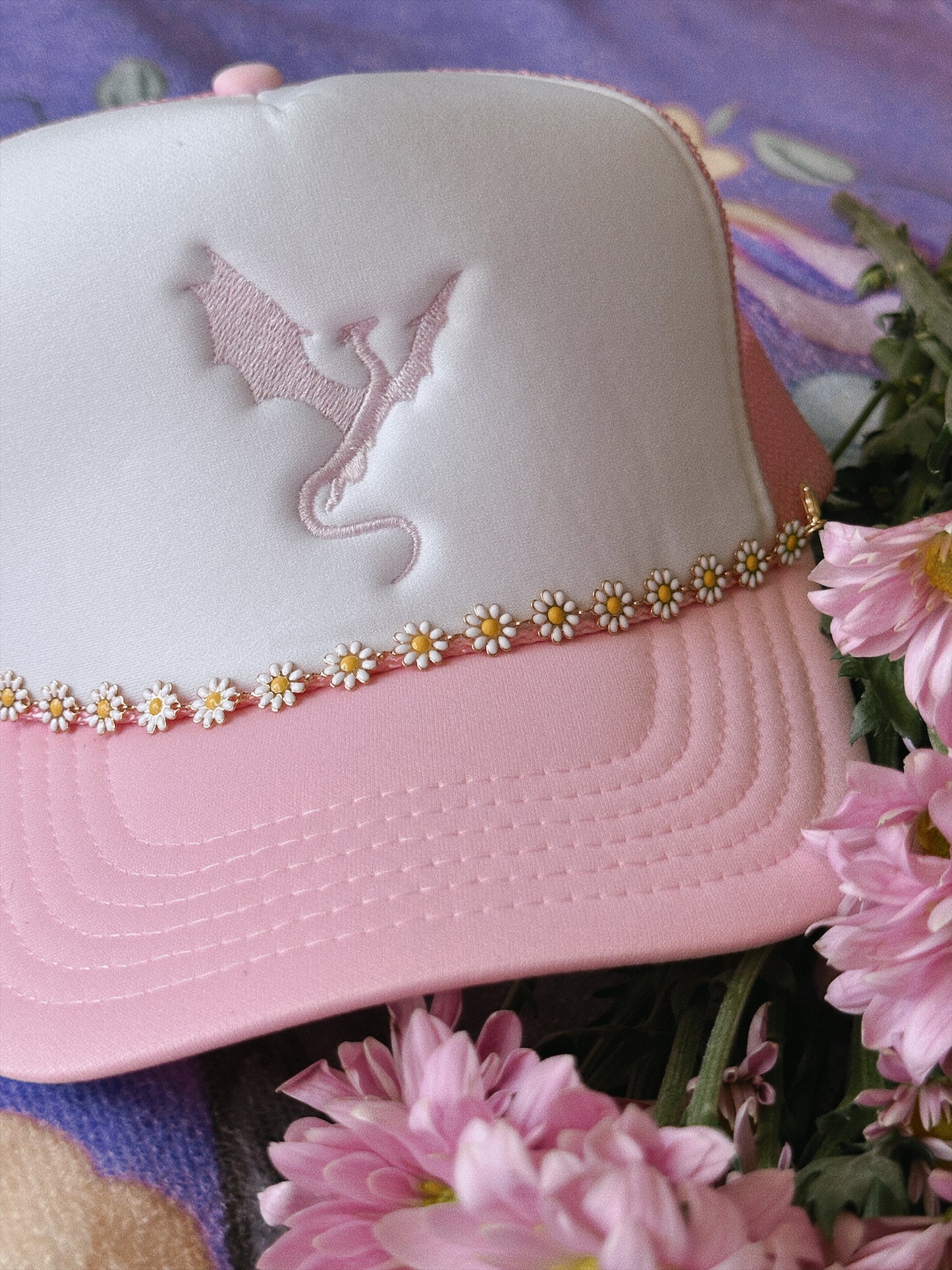 THE FLOWER-LOVING WYVERN TRUCKER HAT