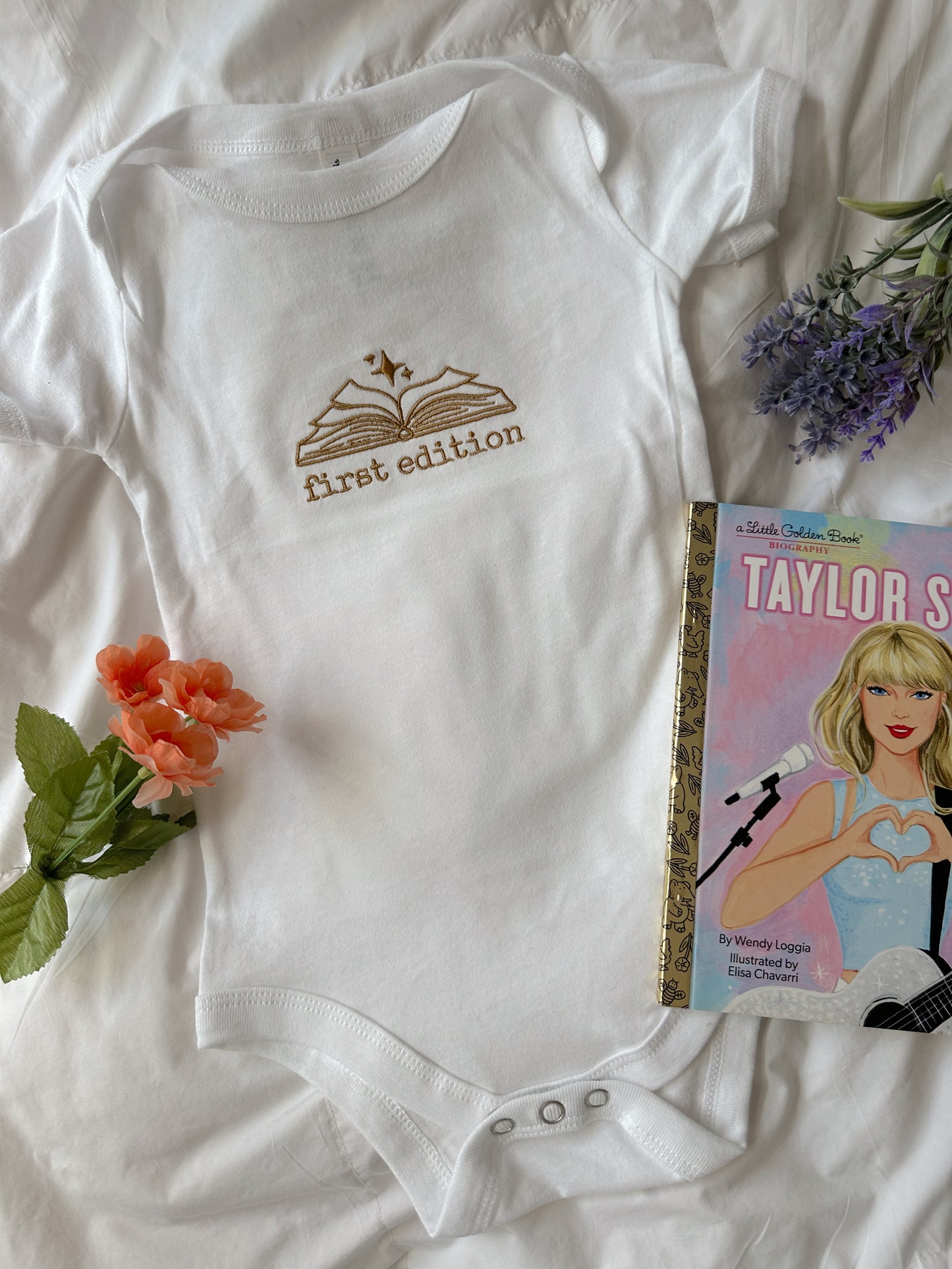 FIRST EDITION EMBROIDERED BABY ONESIE