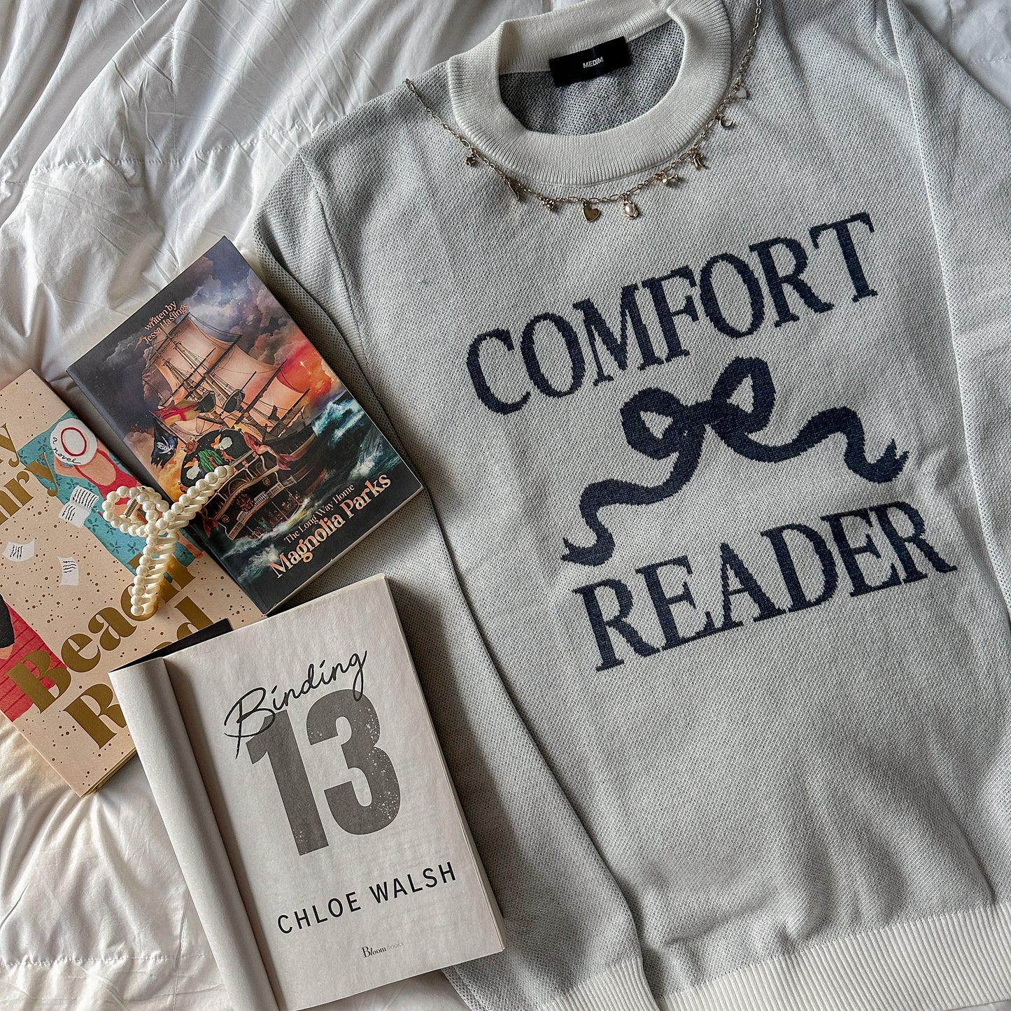 COMFORT READER KNIT SWEATER