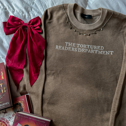 TORTURED READER KNIT SWEATER