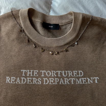 TORTURED READER KNIT SWEATER