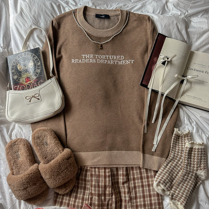 TORTURED READER KNIT SWEATER