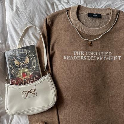 TORTURED READER KNIT SWEATER