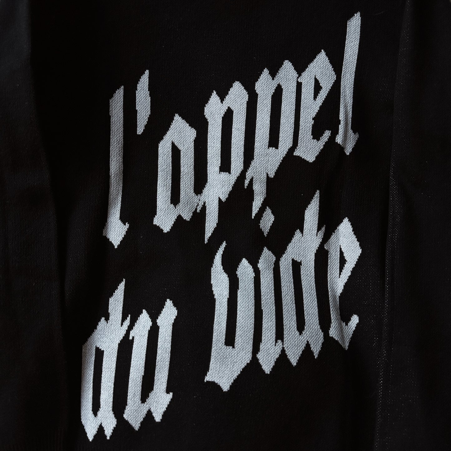 LAPPEL DU VIDE (CALL OF THE VOID) KNIT SWEATER