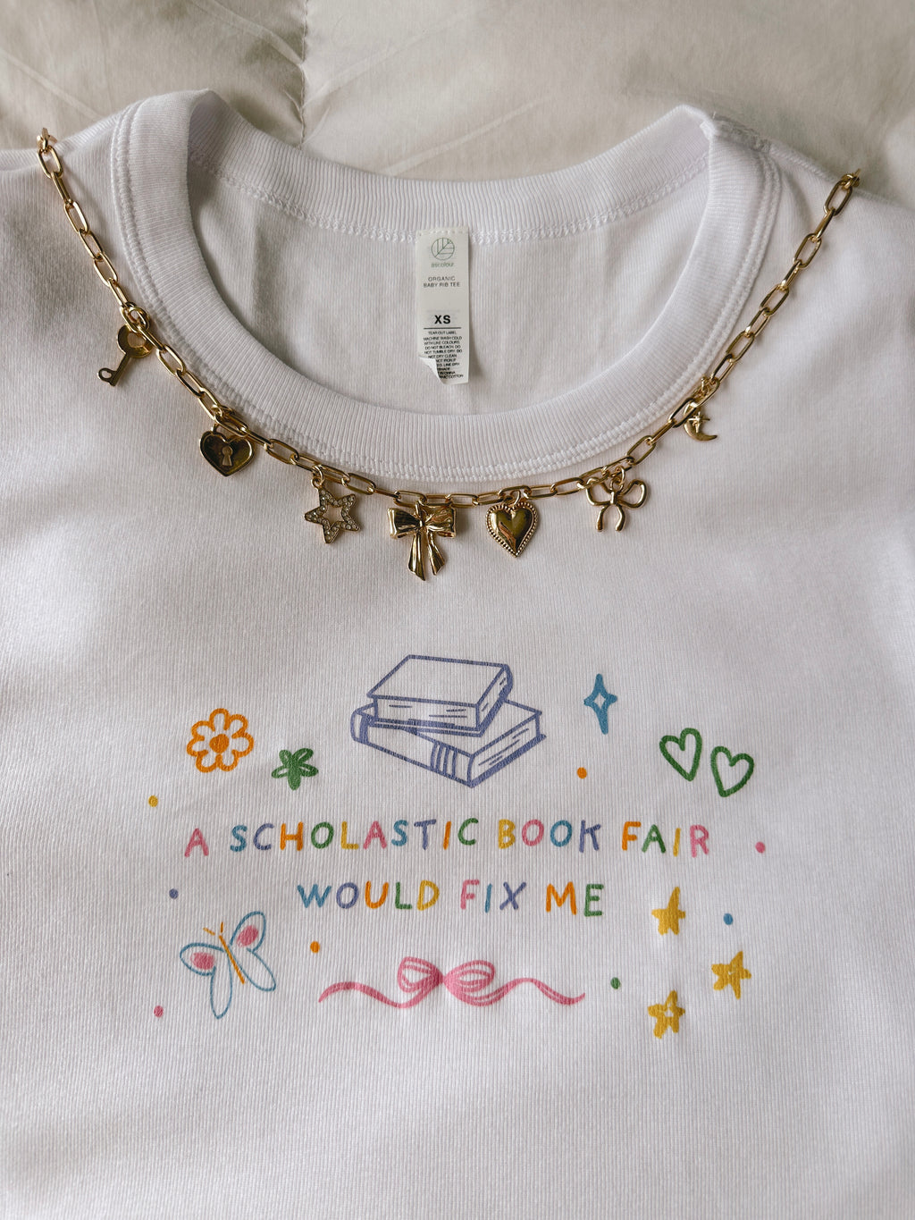 SCHOLASTIC BOOK FAIR BABY TEE